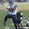 - First Touchdown-Winnipeg Blue Bombers Marty Markett trys to catch Toronto Argonauts Gerald Riggs who scores the first touchdown in first quarter CFL preseason action in Investors Group Field - The Bombers new stadium which opened today - June 12, 2013   (JOE BRYKSA / WINNIPEG FREE PRESS)