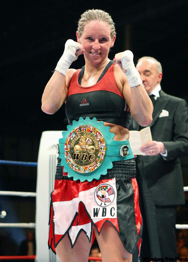 REMY DE LA MAUVINIERE / THE ASSOCIATED PRESS ARCHIVES
Winnipeg boxer Olivia (The Predator) Gerula was all smiles after winning the WBC women’s super featherweight championship in Paris last year, but losing it last month in Sweden has left a bad taste in her mouth.