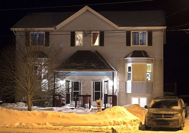 A house is seen on Tiger Maple Drive in Timberlea, N.S, a Halifax suburb, where police found a deceased person early Friday, Feb. 13, 2015. The head of Crime Stoppers in Canada says the tip regarding the alleged mall shooting plot in Halifax was likely the most significant ever received in this country for preventing crime. THE CANADIAN PRESS/Andrew Vaughan