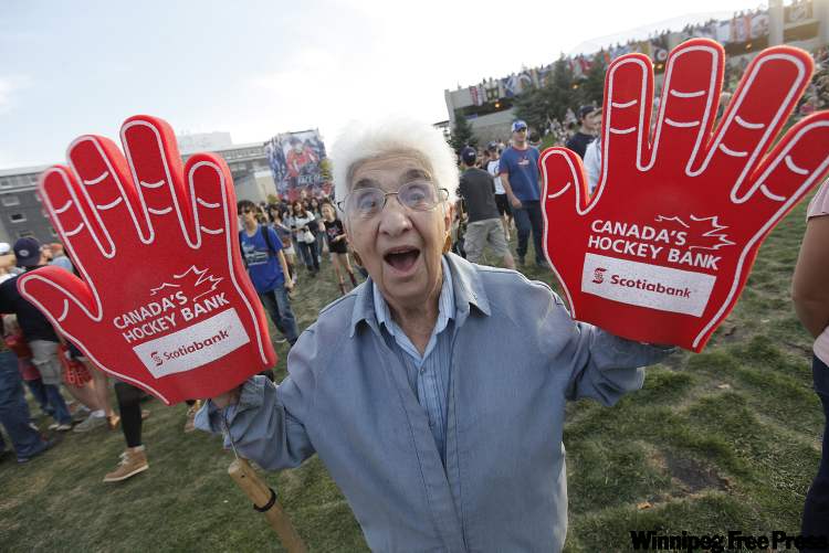 John Woods / Winnipeg Free Press
Frances Pazdor, former secretary at Mark Chipman's high school, shows her support for the Winnipeg Jets at the NHL Faceoff party at The Forks in Winnipeg Thursday.