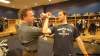 Winnipeg Free Press photos
Mark Flood (right) teaches reporter Geoff Kirbyson one of the Jets' not-so-secret secret handshakes.