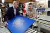 John Woods / THE CANADIAN PRESS
Prime Minister Stephen Harper and Rick Mostert, president of FC Woodworks Inc., use an Edgebender to put an edge on a piece of wood Thursday.