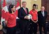 Sean Kilpatrick / THE CANADIAN PRESS
Prime Minister Stephen Harper with team Canada members Rhian Wilkinson, left, Karina Leblanc, and FIFA President Sepp Blatter in the Langevin office in Ottawa on Friday. Canada will host the FIFA Women's World Cup soccer tournament in 2015.