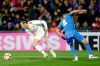 Real Madrid's Gareth Bale, left, controls the ball past Getafe's Bruno Gonzalez during a Spanish La Liga soccer match between Getafe and Real Madrid at the Alfonso Perez stadium in Getafe, Spain, Thursday, April 25, 2019. (AP Photo/Bernat Armangue)
