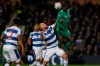 Watford's Ken Sema, right, heads the ball past Queens Park Rangers' Toni Leistner during the English FA Cup 5th round soccer match between Queens Park Rangers and Watford at Loftus Road stadium in London, Friday, Feb. 15, 2019. (AP Photo/Alastair Grant)