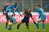 Napoli's Kalidou Koulibaly , left, fights for the ball with Inter Milan's Joao Mario, center during a Serie A soccer match between Inter Milan and Napoli, at the San Siro stadium in Milan, Italy, Wednesday, Dec. 26, 2018. (AP Photo/Luca Bruno)