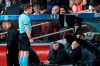 Manchester United coach Ole Gunnar Solskjaer, bottom, watches German referee Felix Brych as watching the VAR monitor during the Champions League quarterfinal, second leg, soccer match between FC Barcelona and Manchester United at the Camp Nou stadium in Barcelona, Spain, Tuesday, April 16, 2019. (AP Photo/Joan Monfort)