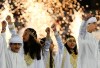 Emirati youth perform the traditional dance during the AFC Asian Cup opening ceremony at Zayed Sport City in Abu Dhabi, United Arab Emirates, Saturday, Jan. 5, 2019. (AP Photo/Kamran Jebreili)