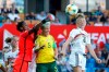 South Africa goalkeeper Andile Dlamini, left, clears the ball against Germany's Linda Dallmann, right during the Women's World Cup Group B soccer match between South Africa and Germany at the Stade de la Mosson in Montpellier, France, Monday, June 17, 2019. (AP Photo/Claude Paris)