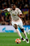 Manchester United's Paul Pogba runs with the ball during the Champions League quarterfinal, second leg, soccer match between FC Barcelona and Manchester United at the Camp Nou stadium in Barcelona, Spain, Tuesday, April 16, 2019. (AP Photo/Joan Monfort)