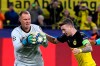 Barcelona's goalkeeper Marc-Andre ter Stegen, left, catches the ball after Dortmund's Marco Reus misses to score on a penalty kick during the Champions League Group F soccer match between Borussia Dortmund and FC Barcelona in Dortmund, Germany, Tuesday Sept. 17, 2019. (AP Photo/Martin Meissner)