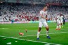 Bottles are thrown on the field by United Arab Emirates fans after Qatar's forward Hasan Al Haydos scores his side's third goal during the AFC Asian Cup semifinal soccer match between United Arab Emirates and Qatar at Mohammed Bin Zayed Stadium in Abu Dhabi, United Arab Emirates, Tuesday, Jan. 29, 2019. (AP Photo/Hassan Ammar)