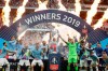 Manchester City's team captain Vincent Kompany lifts the trophy after winning the English FA Cup Final soccer match between Manchester City and Watford at Wembley stadium in London, Saturday, May 18, 2019. Manchester City won 6-0. (AP Photo/Tim Ireland)