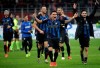 Inter Milan players celebrate end of the Serie A soccer match between AC Milan and Inter Milan, at the San Siro stadium in Milan, Italy, Sunday, March 17, 2019. Inter Milan won 3-2. (AP Photo/Luca Bruno)