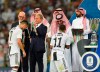 Juventus' Cristiano Ronaldo, left, and Juventus' Douglas Costa receive the winner medals end of the Italian Super Cup final soccer match between AC Milan and Juventus at King Abdullah stadium in Jiddah, Saudi Arabia, Wednesday, Jan. 16, 2019. (AP Photo)