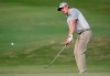 Andrew Putnam hits onto the 10th green during the first round of the Sony Open PGA Tour golf event, Thursday, Jan. 10, 2019, at the Waialae Country Club in Honolulu, Hawaii. (AP Photo/Matt York)