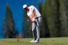 Dustin Johnson hits from the fourth fairway during the first round of the Tournament of Champions golf event, Thursday, Jan. 3, 2019, at Kapalua Plantation Course in Kapalua, Hawaii. (AP Photo/Matt York)