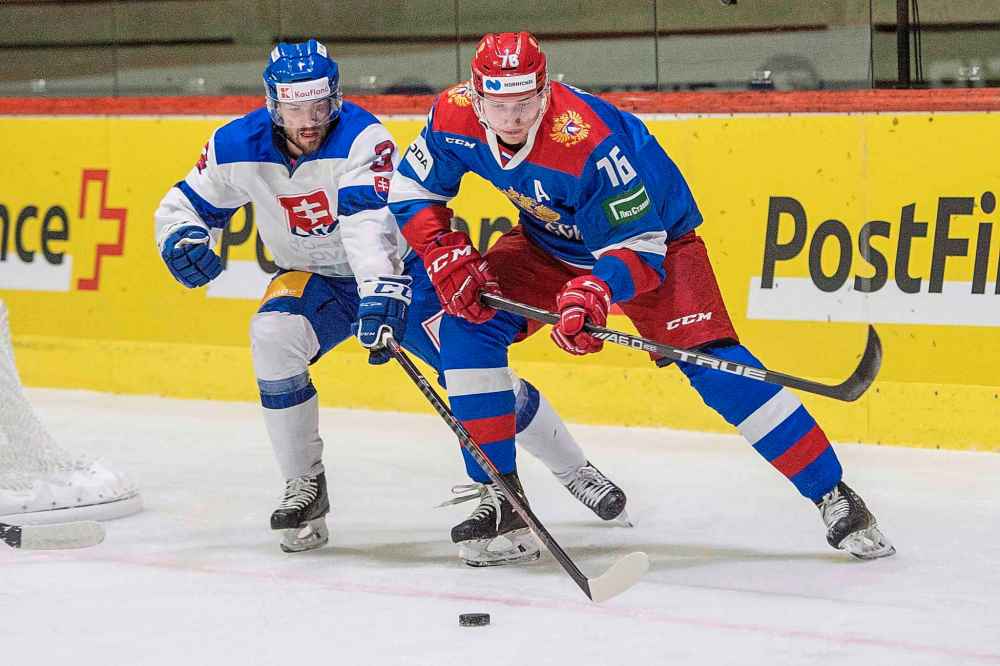 CP
Andrei Chibisov, right, of Russia's Olympic Team plays against Martin Stajnoch, left, from Slovakia during a game between Russia Olympic Team and Slovakia, at the Lucerne Cup in Lucerne, Switzerland, Thursday, Dec. 13, 2018. The Winnipeg Jets agreed to terms with forward Chibisov on a one-year deal on Saturday. THE CANADIAN PRESS/AP-Urs Flueeler/Keystone via AP
