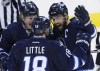 JOHN WOODS / the canadian press 
Winnipeg Jets Jacob Trouba, Bryan Little and captain Andrew Ladd are helping lead a rejuvenated team on its quest for post-season play.