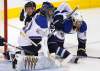 John Woods / THE CANADIAN PRESS
Winnipeg Jets' Kyle Wellwood is sandwiched between St. Louis Blues Barret Jackman and goalie Jaroslav Halak in the first period Saturday.