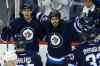 CP
Winnipeg Jets' Mark Scheifele (55) and Mathieu Perreault (85) celebrate Scheifele's goal on Chicago Blackhawks goaltender Corey Crawford (50) during third period NHL action in Winnipeg on Thursday, October 29, 2015. THE CANADIAN PRESS/John Woods