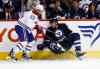 JOHN WOODS / WINNIPEG FREE PRESS
Montreal Canadiens' Francis Bouillon checks Winnipeg Jets' Blake Wheeler during second-period NHL action at the MTS Centre in Winnipeg Tuesday.