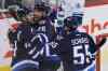 John Woods / THE CANADIAN PRESS FILES
The Jets are hoping to get right back in the air, such as here, where Blake Wheeler (26) and Devin Setoguchi celebrate the winner over Vancouver Jan. 31.