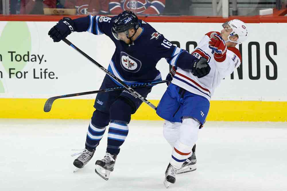 JOHN WOODS / The Canadian Press files
Winnipeg Jets' Shawn Matthias (16) and Montreal Canadiens' Brendan Gallagher (11) collide during first period NHL action in Winnipeg on Saturday, November 4, 2017.