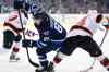 John Woods / The Canadian Press
Winnipeg Jets' Mathieu Perreault (85) gets around New Jersey Devils' Adam Henrique (14) during the second period of Tuesday's game in Winnipeg. The Jets won 3-1.