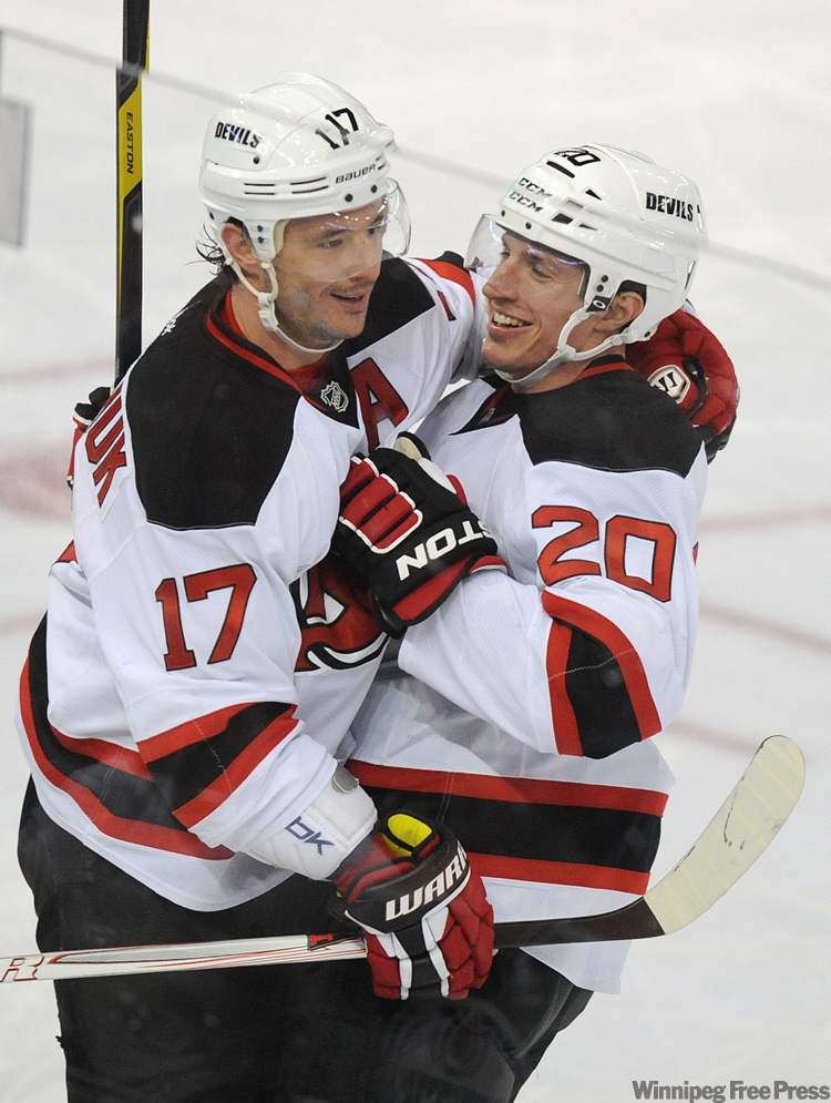 CP
Ilya Kovalchuk (left) sniped his 17th in Edmonton Wednesday. The Devils' top scorer will be bombarded by boos today.
