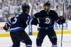 John Woods / Winnipeg Free Press
Winnipeg Jets' Bryan Little (18) and Mark Stuart (5) celebrate Little's goal.