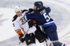 John Woods / The Canadian Press 
Winnipeg Jets' Mark Stuart (5) hits Anaheim Ducks' Ryan Getzlaf (15) during first period.