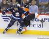 Trevor Hagan / The Canadian Press
Winnipeg Jets' Evander Kane hits Philadelphia Flyers' Tomas Fleischmann during the first period Saturday at the MTS Centre.