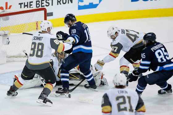CPJOHN WOODS / THE CANADIAN PRESSVegas Golden Knights goaltender Marc-Andre Fleury (29) keeps his eye on the puck as Nate Schmidt (88) and Luca Sbisa (47) defend against Winnipeg Jets' Bryan Little (18) and Mathieu Perreault (85) Saturday at Bell MTS Place. The Golden Knights will be looking to rebound from their Game 1 loss.