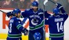 DARRYL DYCK / THE CANADIAN PRESS FILES
Kevin Bieksa, Ryan Kesler (centre) and Alex Burrows,who began their professional careers in Winnipeg, return to the MTS Centre Wednesday night.