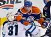 Jason Franson / The Canadian Press
Winnipeg Jets' goalie Ondrej Pavelec (31) is elbowed by Edmonton Oilers' Nail Yakupov (64) during second period NHL hockey action in Edmonton, Alta., on Monday.