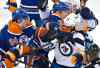 JASON FRANSON / The Canadian Press
Winnipeg Jets' Zach Bogosian (44) tangles with Nail Yakupov (64) and Andrew Ference (21) of the Edmonton Oilers during the third period.