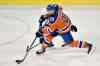 John Ulan / The Canadian Press
Mark Stuart, left, defending against the Edmonton Oilers' Luke Gazdic, played his 600th game in the NHL.
