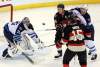 Fred Chartrand / The Canadian Press
Winnipe Jets goaltender Al Montoya (3) looks on as teammate Jim Slater (19) Ottawa Senators Chris Neil (25) and Zack Smith (15) watch a flying puck during first period NHL hockey between the Ottawa Senators and the Winnipeg Jets in Ottawa Saturday.