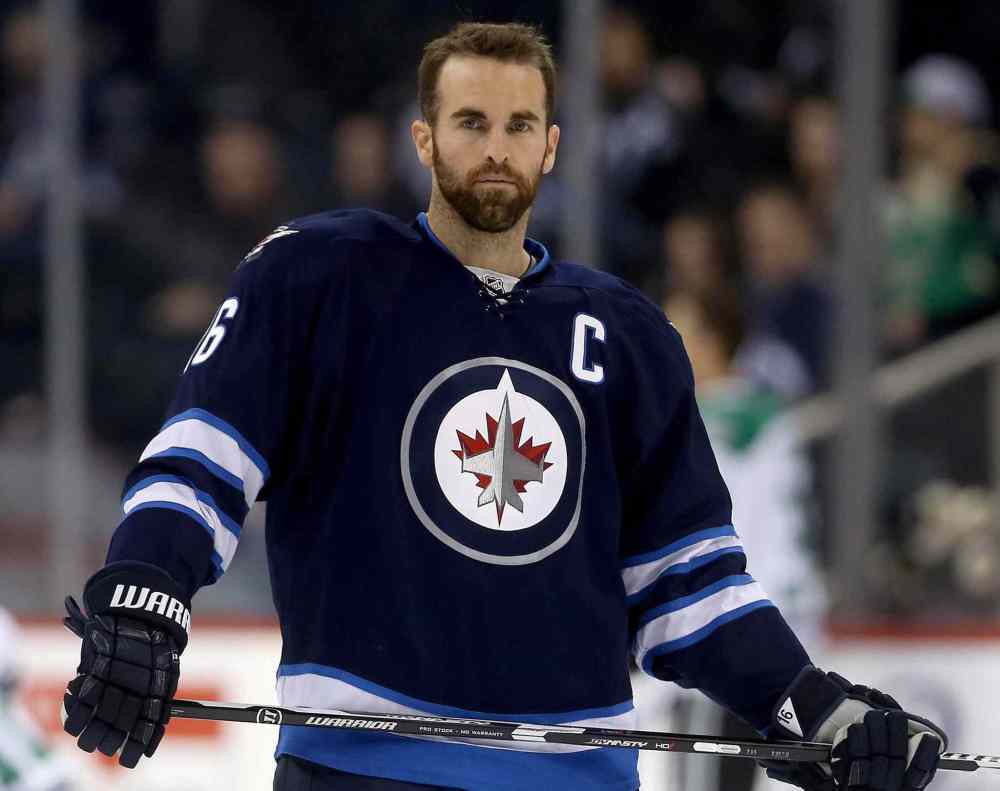 CP
Winnipeg Jets' Andrew Ladd (16) warms up as the Jets prepare to play the Dallas Stars during NHL hockey action in Winnipeg, Tuesday, February 23, 2016. Winnipeg Jets trade captain Andrew Ladd to Chicago Blackhawks. THE CANADIAN PRESS/Trevor Hagan