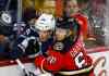 CP
Winnipeg Jets' Tobias Enstrom, left, of Sweden, is checked by Calgary Flames' Markus Granlund, from Finland, during first period NHL hockey action in Calgary, Tuesday, Dec. 22, 2015.THE CANADIAN PRESS/Jeff McIntosh