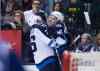 THE CANADIAN PRESS/Darren Calabrese
Winnipeg Jets' Alexander Burmistrov, right, celebrates his game-winning goal with teammate Blake Wheeler during the third period.