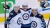 JONATHAN HAYWARD / THE CANADIAN PRESS
Winnipeg Jets center Mark Scheifele (55) celebrates his goal with teammates Tyler Myers (57) and Nikolaj Ehlers (27) during third period NHL action against the Vancouver Canucks at Rogers Arena in Vancouver, Saturday, Dec. 22, 2018.