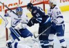 John Woods / The Canadian Press 
Winnipeg Jets' Mark Scheifele (55) attempts to knock the puck down behind Tampa Bay Lightning goaltender Ben Bishop (30) as Ryan Callahan (24) defends during first period NHL action in Winnipeg on Friday.
