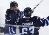 John Woods / The Canadian Press 
Winnipeg Jets' Blake Wheeler (26) and Ben Chiarot (63) celebrate Chiarot's goal against the Toronto Maple Leafs and his first NHL goal during third period NHL action in Winnipeg on Saturday.