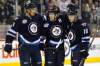 Canadian Press archives
Winnipeg Jets' Evander Kane, Toby Enstrom (centre), and Bryan Little celebrate a goal.