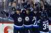John Woods / THE CANADIAN PRESS FILES
Winnipeg Jets Mark Scheifele, Evander Kane, Zach Bogosian and Toby Enstrom (from left) celebrate one of the team's scarce goals.