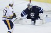 John Woods / The Canadian Press 
Nashville Predators' Mike Ribeiro (63) deflects the shot from the point past Winnipeg Jets goaltender Ondrej Pavelec (31) in the first period of Friday's home opener. The goal stood as the game winner.