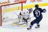 THE CANADIAN PRESS/John Woods
Winnipeg Jets' Nikolaj Ehlers (27) scores on Nashville Predators goaltender Pekka Rinne (35) during the first period.