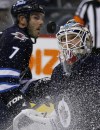 John Woods / The Canadian Press
Goaltender Michael Hutchinson keeps a close eye on the puck during the third period pre-season against the Ottawa Senators in Winnipeg on Sunday.